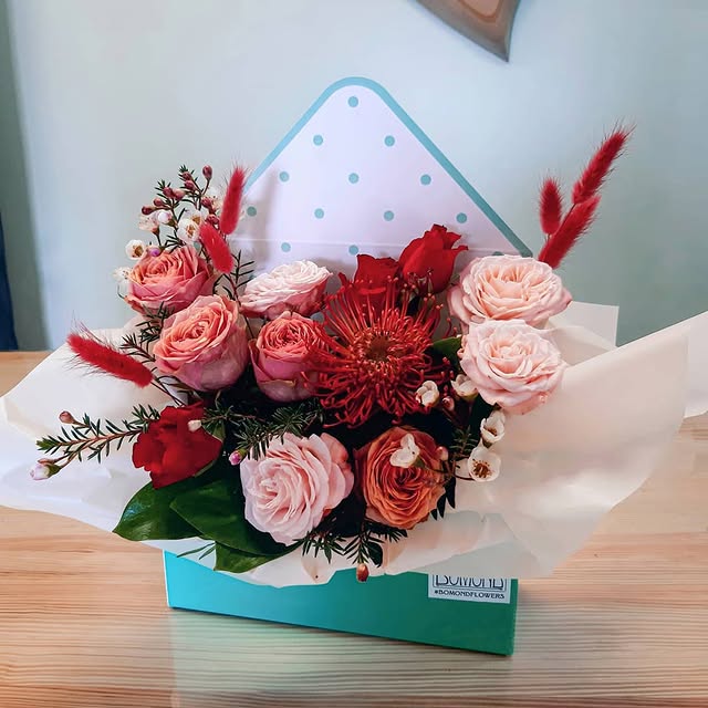 Envelope Bouquet with Roses and Red Accents
