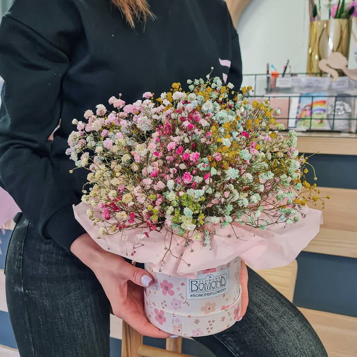 Bouquet of multicolored gypsophila in a stylish box