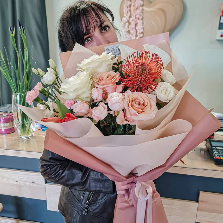 Luxury bouquet of roses and exotic flowers