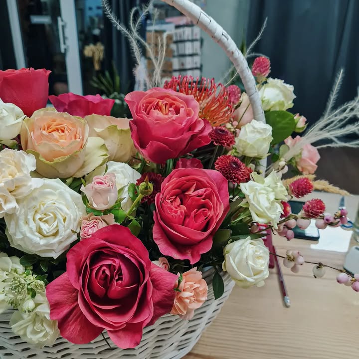 Basket with Bright Roses and White Flowers