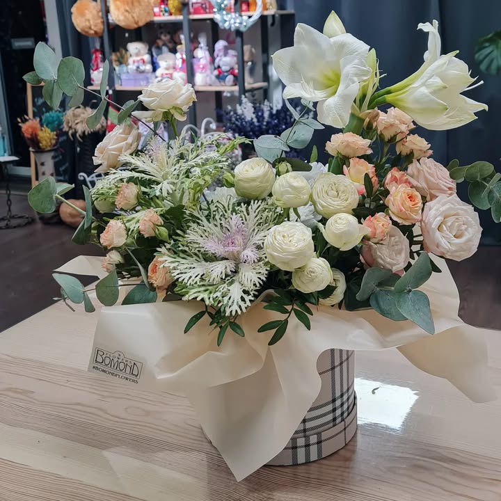 Flower Arrangement in Box with Hippeastrum and Roses