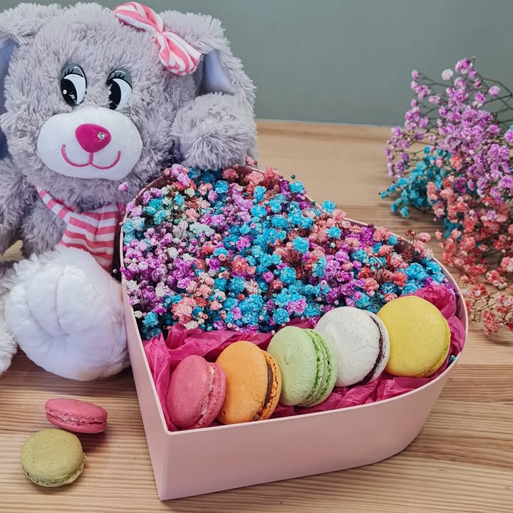 Romantic Heart-Shaped Bouquet with Bright Gypsophila and Macarons