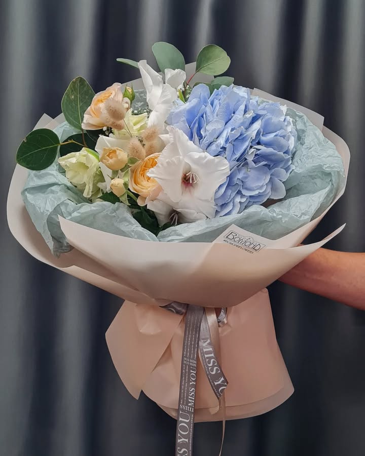 Bouquet with Blue Hydrangea and White Eustomas