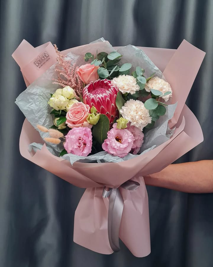 Bouquet with Protea and Pink Flowers in Soft Tones