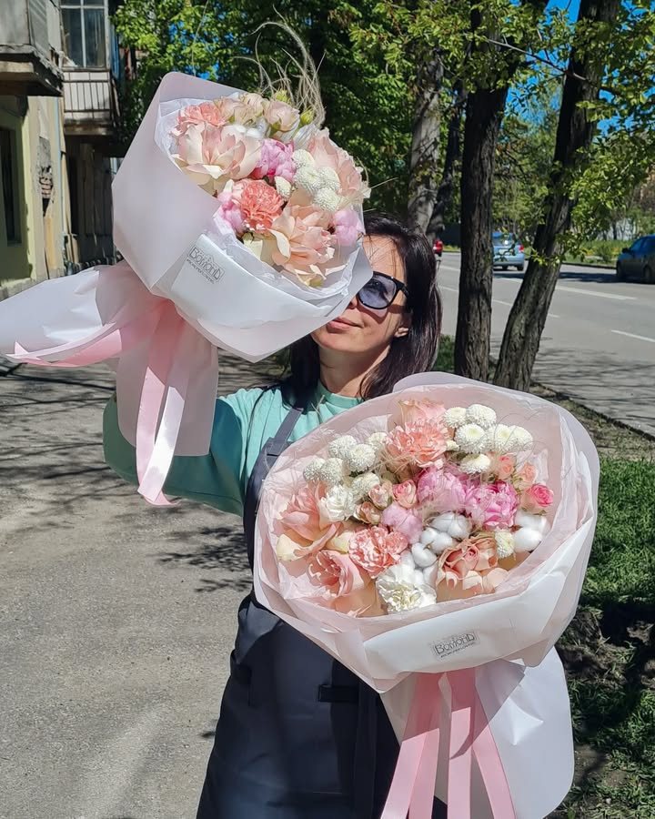 Elegant bouquet with peony-like roses and cotton for Mother's Day