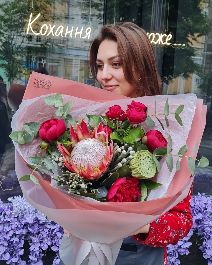 Bouquet with exotic protea and peonies