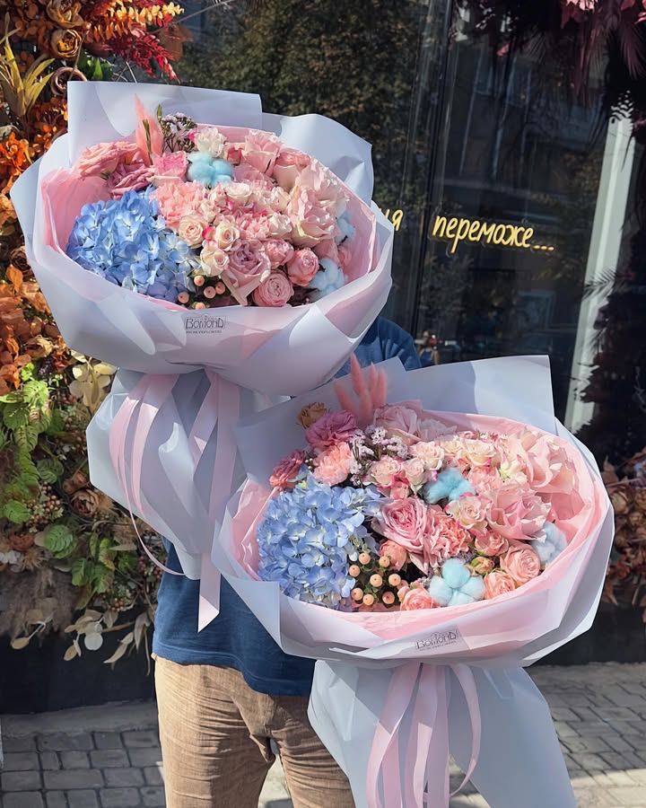 Bouquet of delicate roses and blue hydrangea with cotton
