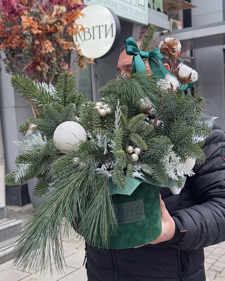 New Year floral arrangement with pine branches and cotton