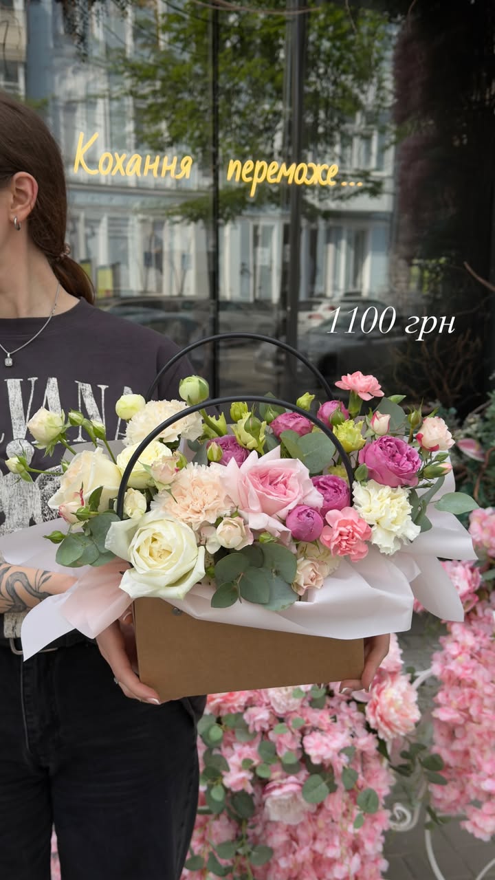 Floral basket with pink and white peonies and roses